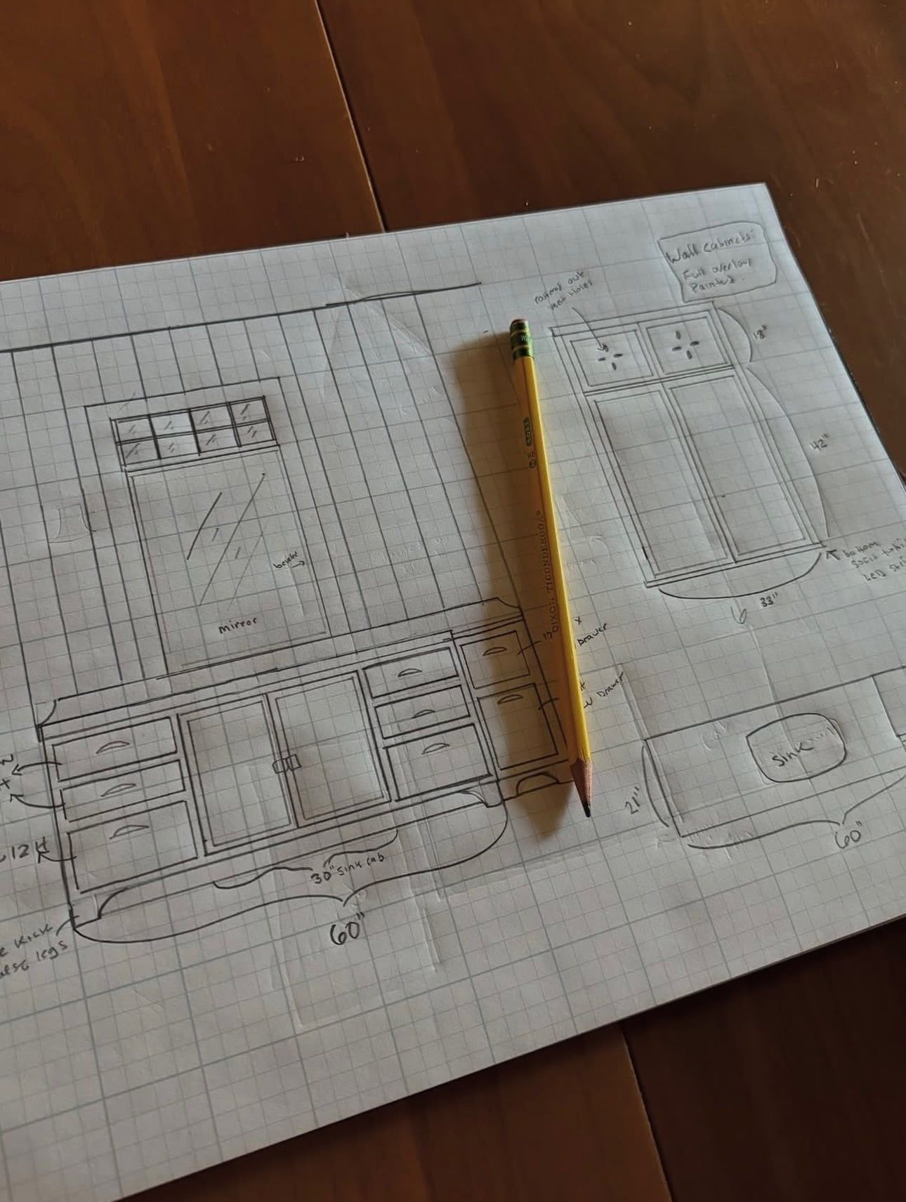 A pencil sketch of the vanity and mirror on graph paper