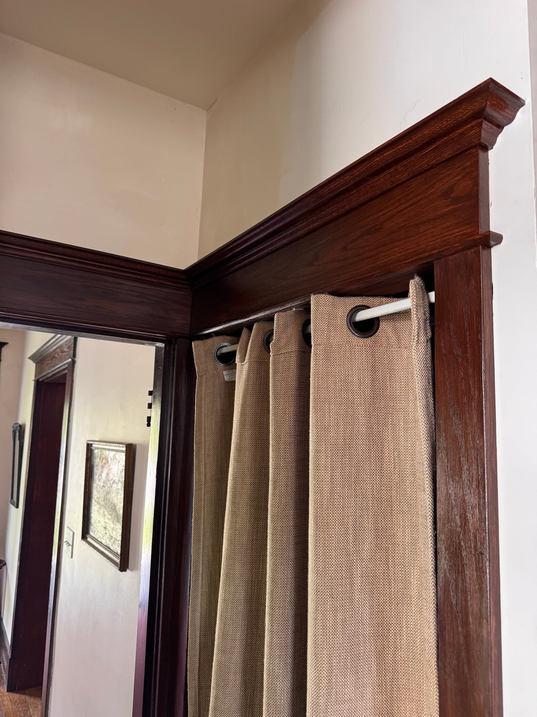 The corner where two of the triple doorway’s casing heads meet