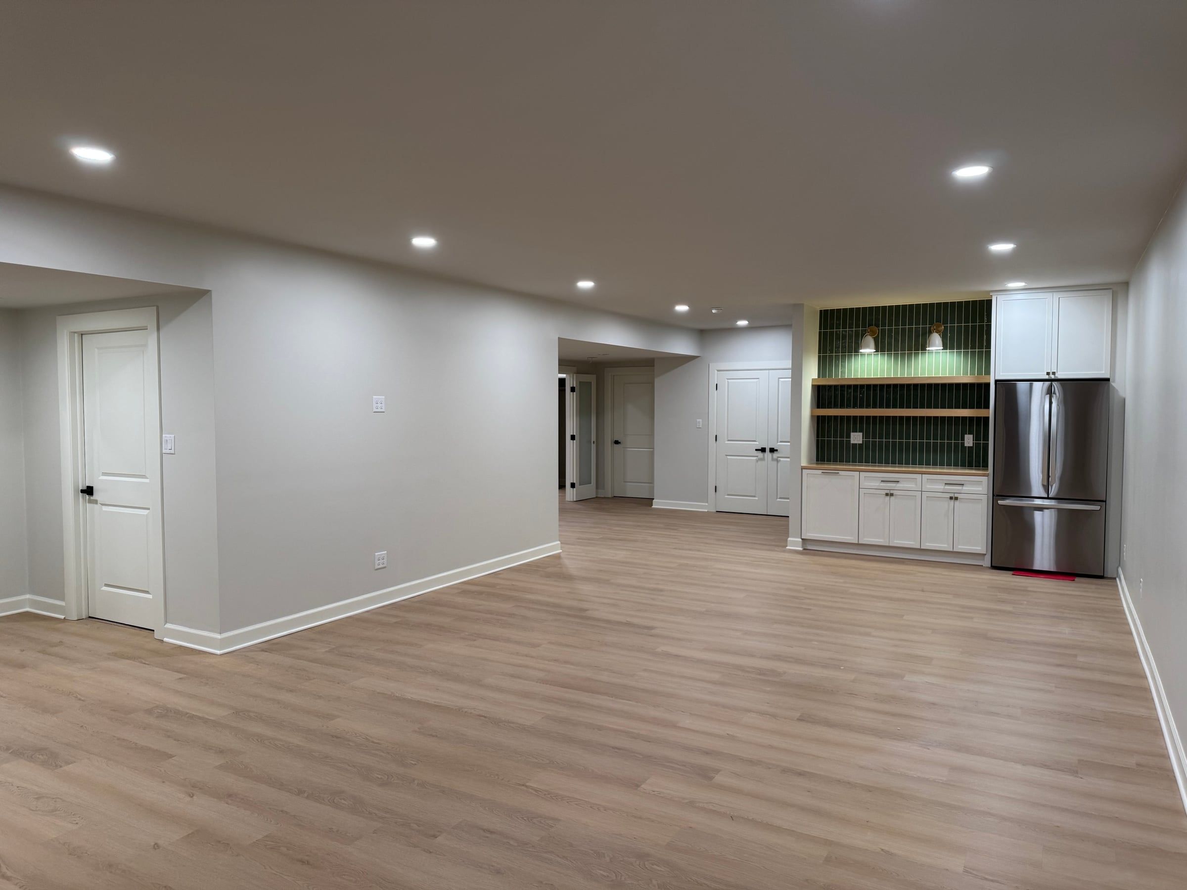 The great room: an open space with room for several seating areas, with the bar at the far end